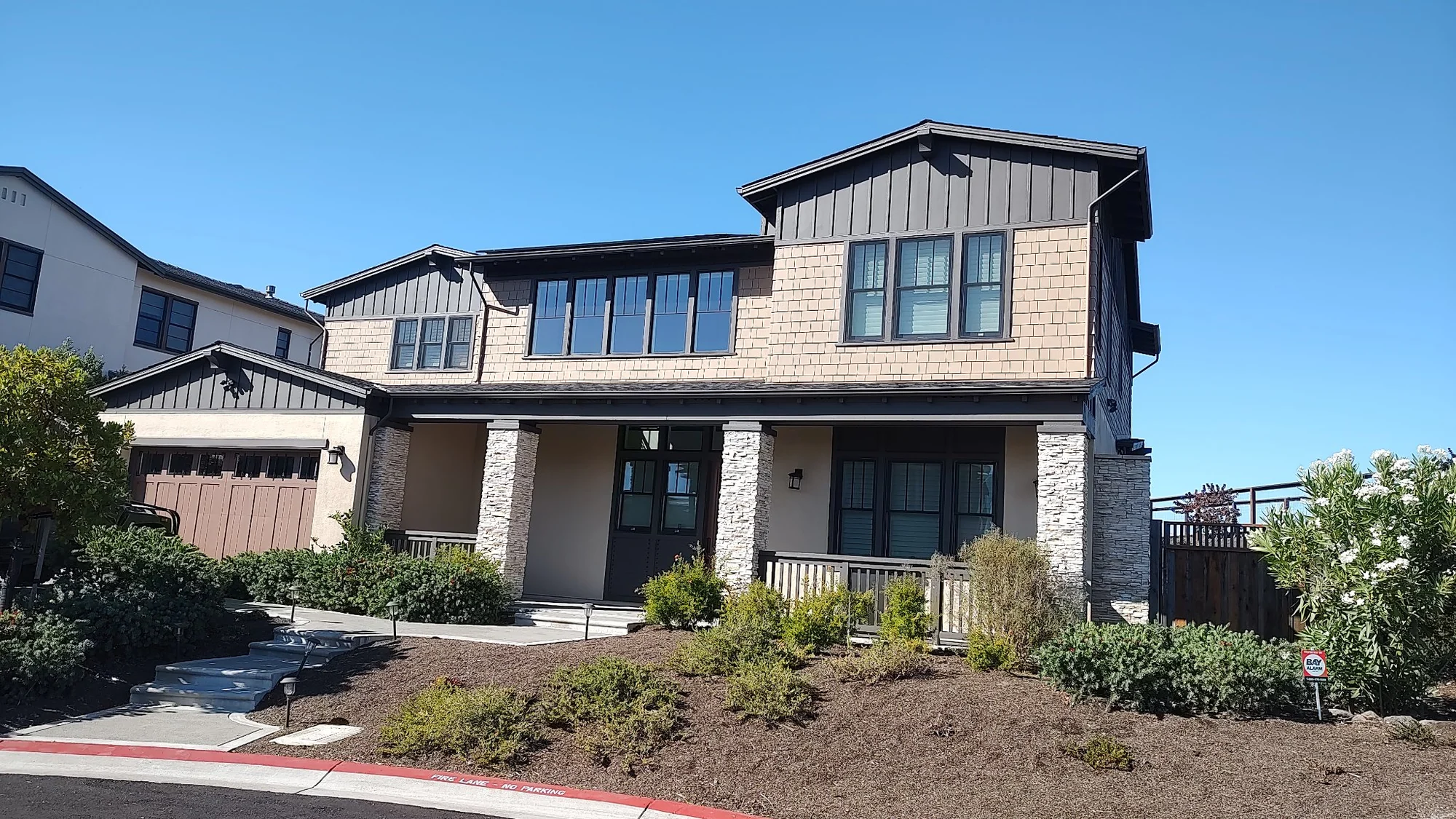 Modern home with completed exterior paint finish